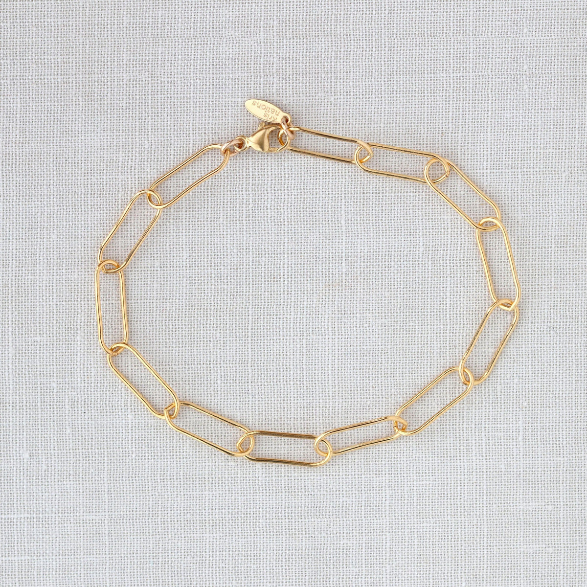 Large Link Chain Bracelet in gold-filled on white linen