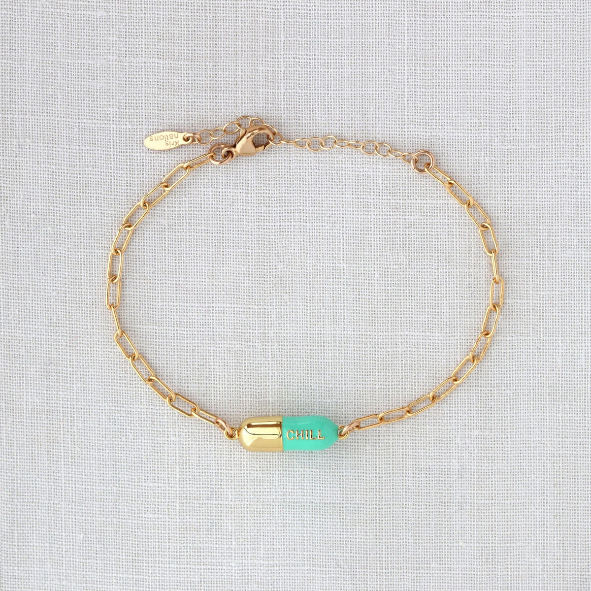 Turquoise Chill Pill Bracelet on white linen