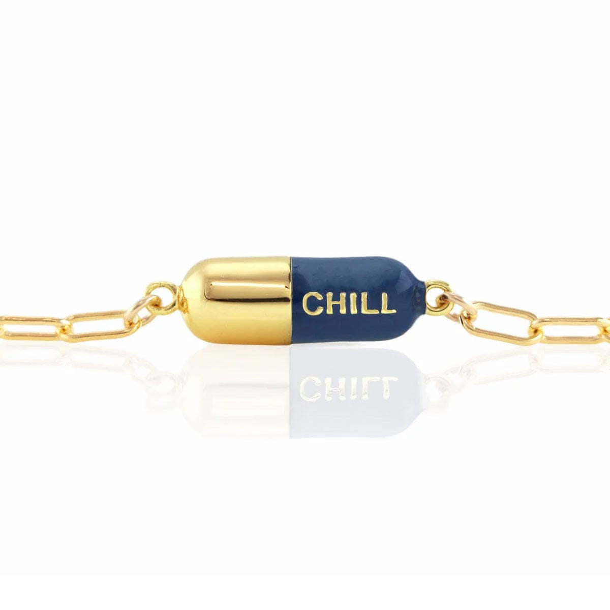 Navy Chill Pill Bracelet on a gold link chain