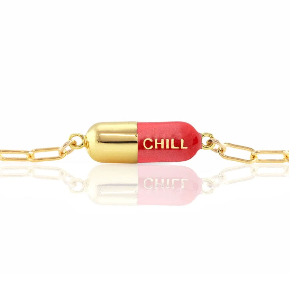 Red Chill Pill Bracelet on a gold link chain