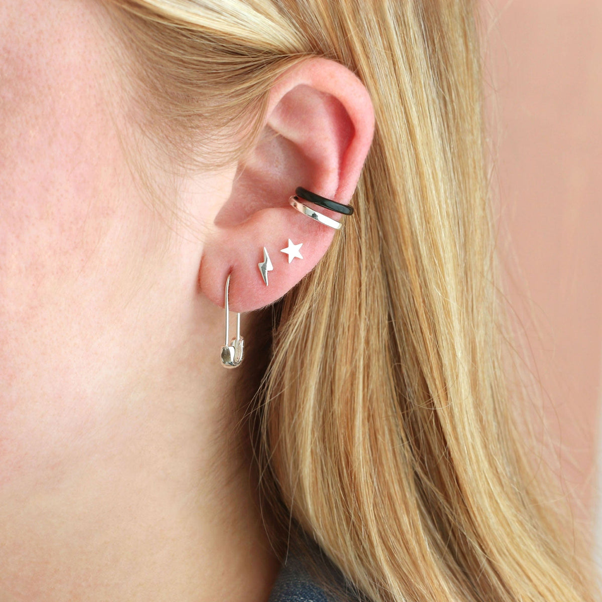 Star Stud worn in an ear stack with a safety pin hoop and an ear cuff