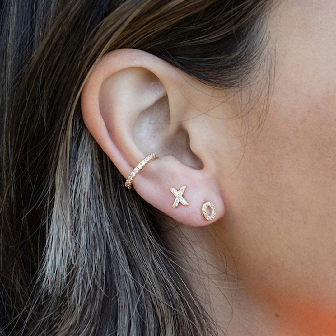 Gold XO Crystal Studs worn with a crystal ear cuff