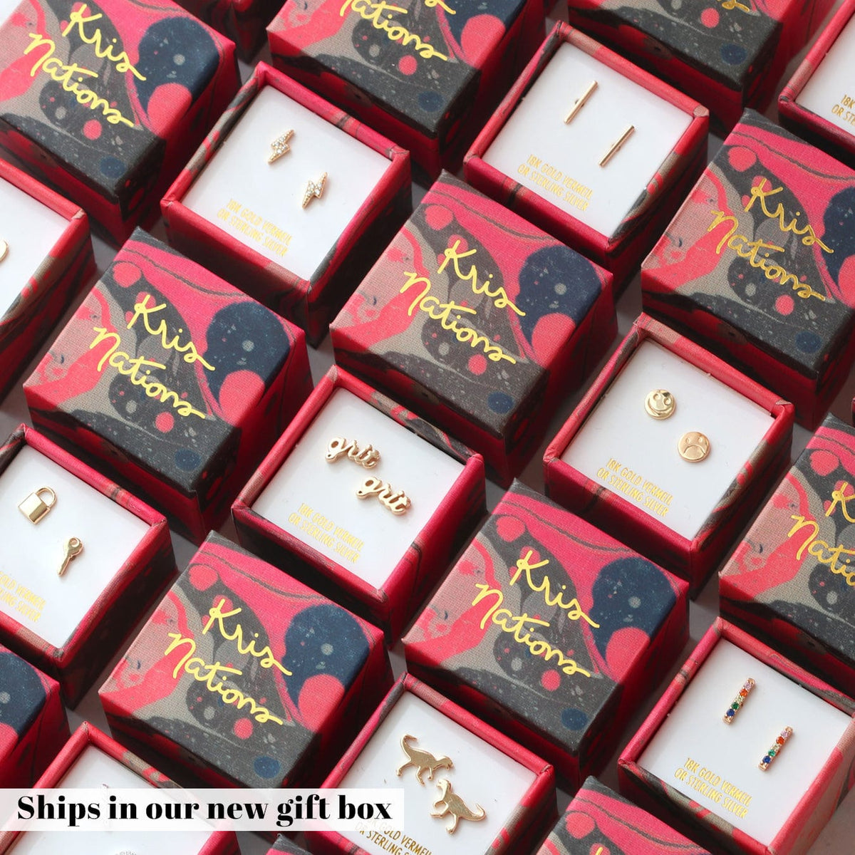 Kris Nations red patterned gift boxes, each holding a pair of stud earrings